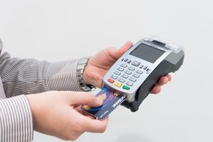 swiping debit/credit card 